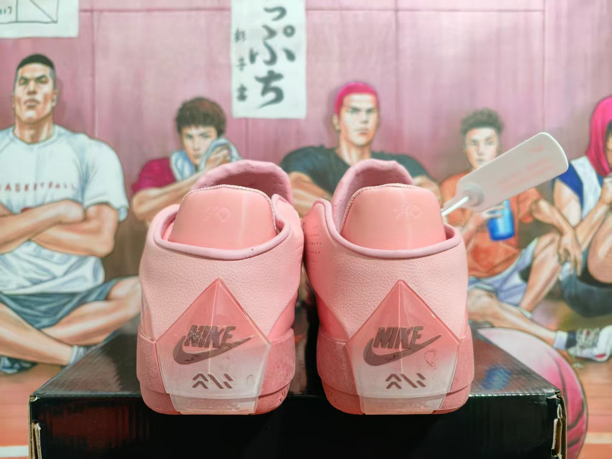 Rear view of pink Jordan basketball shoes with heel branding
