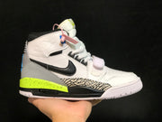 Close side view of the white high-top sneaker with black Swoosh, elephant-print panel and neon yellow midsole.