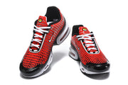 Front and angled views of red Nike Air Max Plus sneakers with white laces