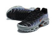 Pair of Nike Air Max Plus sneakers viewed from above and at an angle