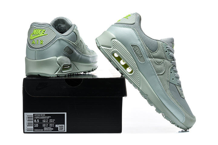 Nike Air Max 90 QS gray and lime sneakers displayed on a shoe box; the box label shows a sample size.