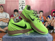 Pair of green Nike basketball shoes shown from multiple angles