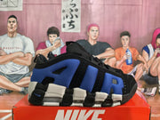 Side profile of a blue and black Nike basketball sneaker