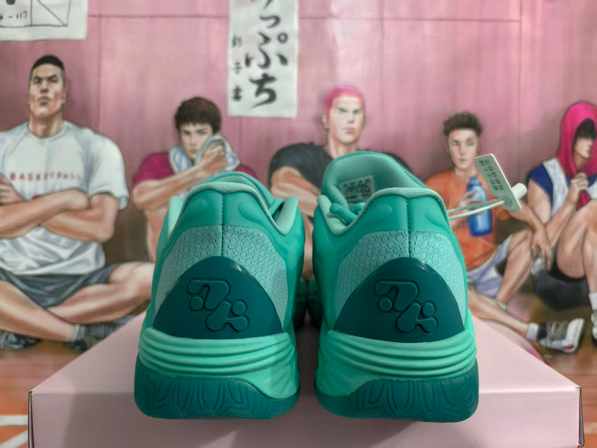 Rear view of mint green basketball sneakers showing textured heel panels and dark green heel details