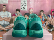 Rear view of mint green basketball sneakers showing textured heel panels and dark green heel details