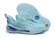 Light blue Curry sneakers shown from the side and outsole, with textured tread visible.