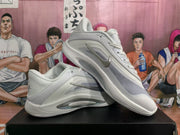 Angled display of paired white Nike sneakers highlighting the silver swoosh, padded collars, and sculpted soles.