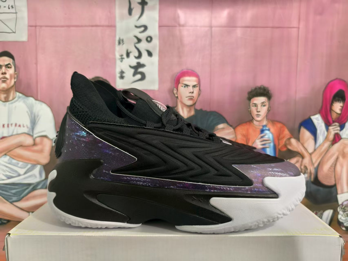 Side view of black and purple basketball sneakers resting on a box.