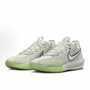 Pair of light gray and pale green Nike basketball sneakers with translucent green outsoles.