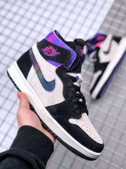 Angled front-side view highlighting the perforated toe box, black laces and purple collar.