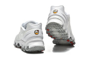 Rear and outsole views of white Nike Air Max DN sneakers with gray tread and red accents.