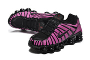 Pair of purple and black Nike Shox TL sneakers shown from side and top angles.