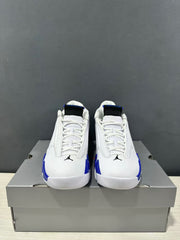 Front view showing the white uppers, blue accents, black tongues, and Jordan branding.