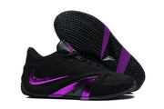 Black and purple shoes shown from the side with the textured outsole visible