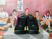 Front view of the pair showing black laces, Jordan tongue branding, and yellow side accents.