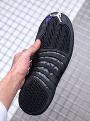 Bottom view showing the black rubber outsole with herringbone-patterned tread.