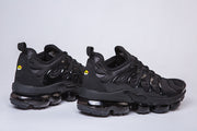 Pair of black Nike-style sneakers shown from the sides and heels.