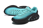 Pair of turquoise and black Nike Air Max DN sneakers viewed from above.