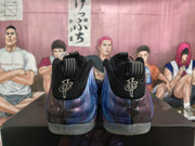 Rear view showing the black heel collars and galaxy-patterned shells of the sneakers