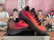 Angled side view showing the patterned upper, padded collar, and textured outsole.