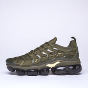 Side view of an olive green Nike Air VaporMax Plus TN-8 sneaker on a light background.