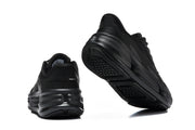 Rear and outsole views of a black Nike Comfort Ride EasyOn sneaker.