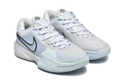 Angled front view of the Nike GT Cut sneakers highlighting the perforated upper, lace-up closure, and layered sole.
