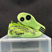 Lime-green patterned sneaker shown beside its ribbed outsole