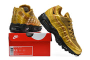 Gold-tone Nike Air Max 95 TT sneakers shown with a box; the box label shows sample size 8.5 and style code IV2872 707.