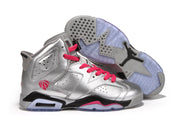 Silver-gray high-top sneakers with pink laces, black midsole details, and one shoe showing the translucent blue outsole.