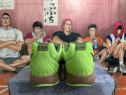 Rear view of green Nike basketball shoes with brown midsoles