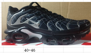 Black grid-pattern sneaker shown on a box with a size range caption