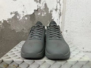 Front view of dark gray Nike Kobe 5 FTB shoes with lace-up fronts and perforated toes.