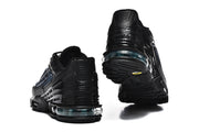 Rear view of the sneakers highlighting the sculpted heels and visible cushioning units.