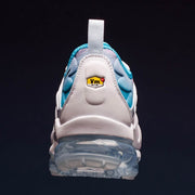 Rear view showing the heel, blue accents, and clear-looking sole unit
