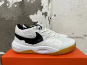 Side view of a white and black Nike Hyperquick low-top training shoe