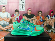 Side profile of mint-green Nike basketball shoes with blue and orange details