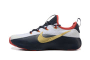 Side view highlighting the gold-colored LeBron logo and navy outsole