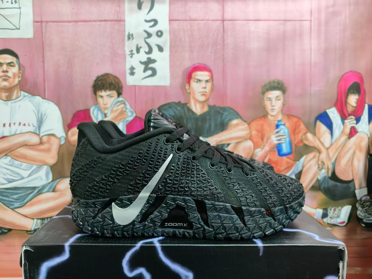 Side view of black Nike LeBron basketball shoes with a silver Swoosh and textured patterned sole