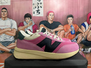Side view of a pink New Balance U370 sneaker with black side detailing and a light-colored sole