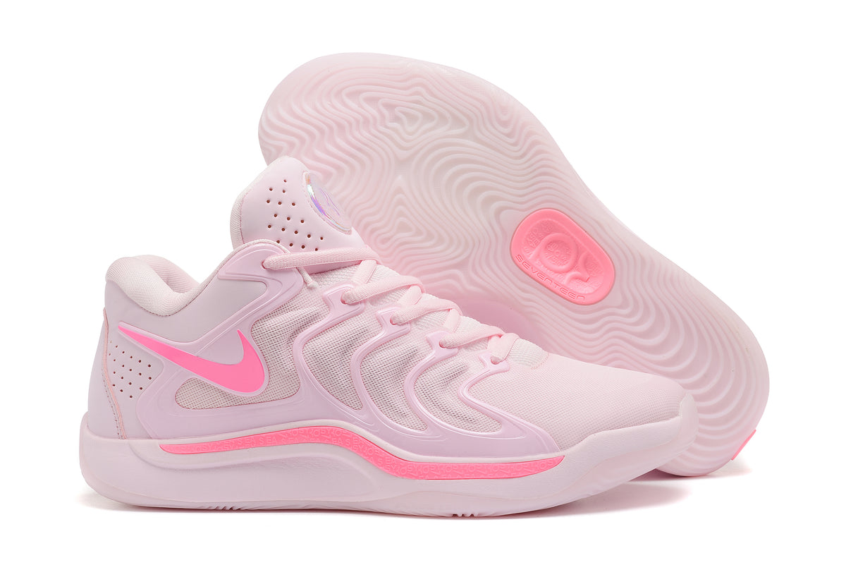 Pink Nike KD 17 basketball shoes with a pale pink patterned outsole.