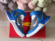 Top-down view of the pair displaying the side swooshes and white segmented outsoles.