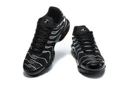 Front and top views of black and silver Nike Air Max Plus sneakers