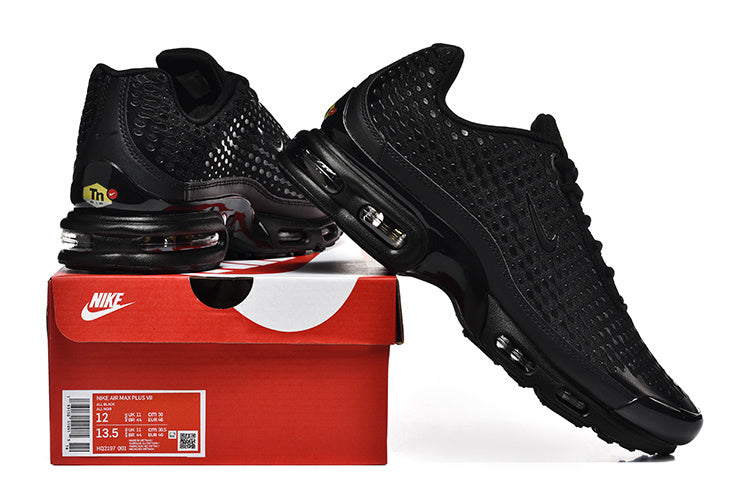 Black Nike Air Max Plus VII sneakers displayed with a shoebox