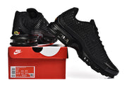 Black Nike Air Max Plus VII sneakers displayed with a shoebox