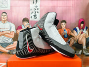 Pair of gray, black, and red Nike wrestling shoes shown from the side.