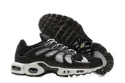 Side and outsole views of the sneakers, including multicolored outsole flecks