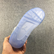 Underside view of the translucent blue outsole with a visible Jordan logo.