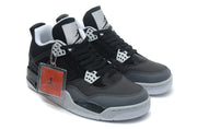 Front three-quarter view of the pair with a red hangtag attached to one shoe.