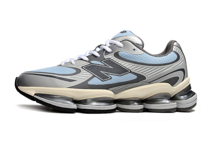 Blue-gray New Balance 2000 Series sneaker in side profile.